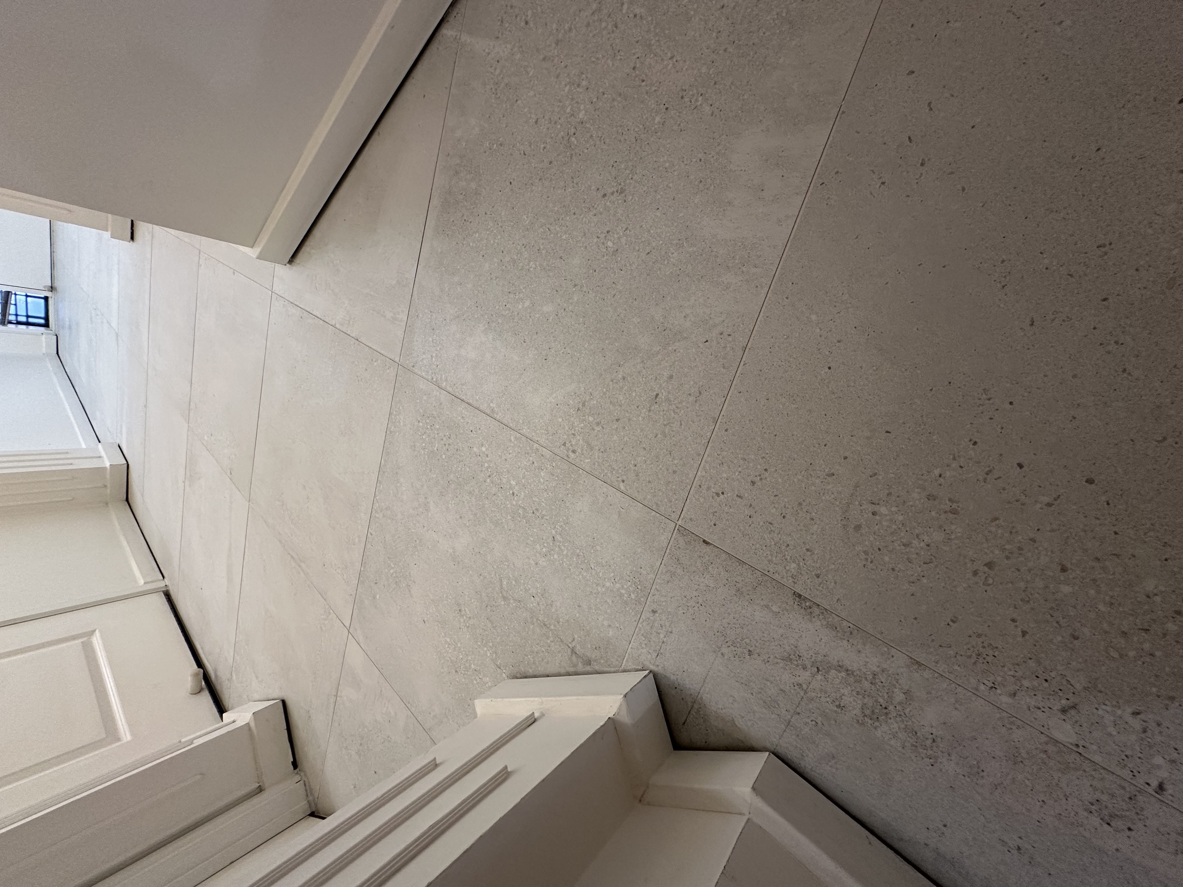 Timber-look floor tiles installed with straight lines and neat grout